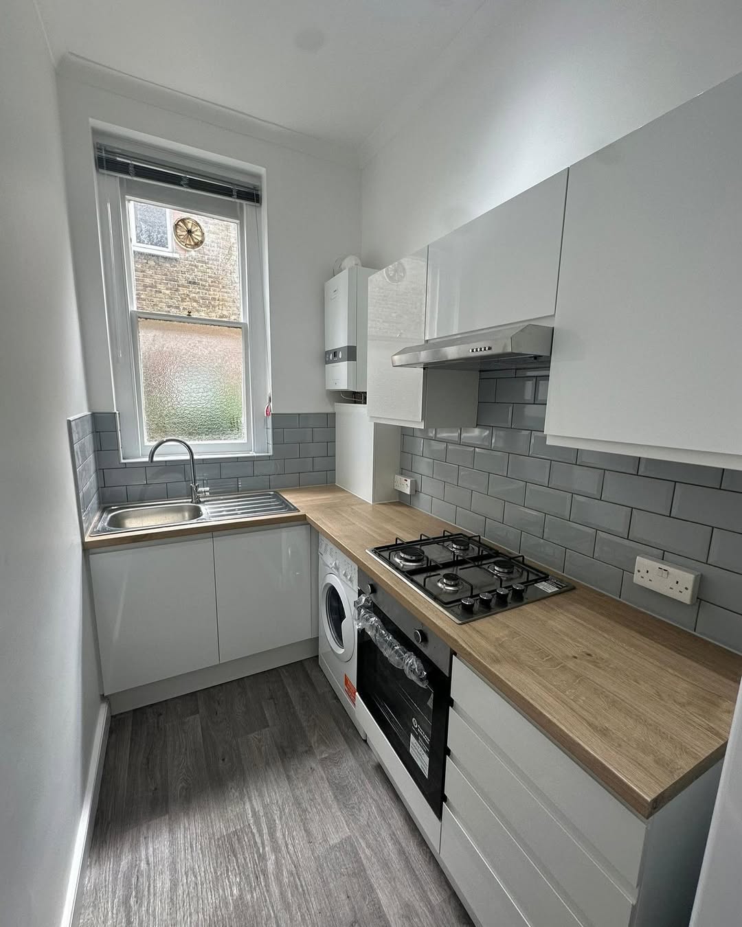 Full Kitchen Refurbishment CompleteWe’ve transformed a worn-out kitchen into a sleek, stylish, a (1)