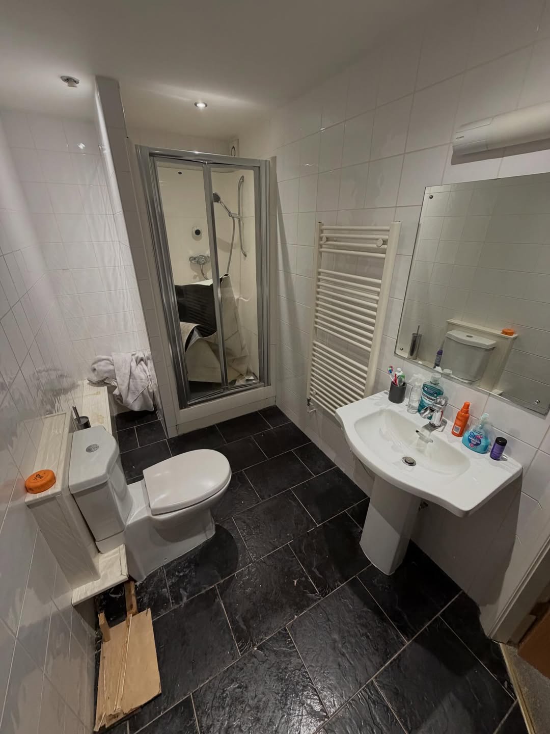 Clean lines. Warm lighting. Luxury finish.Another bathroom transformed into a modern, spa-like s (1)